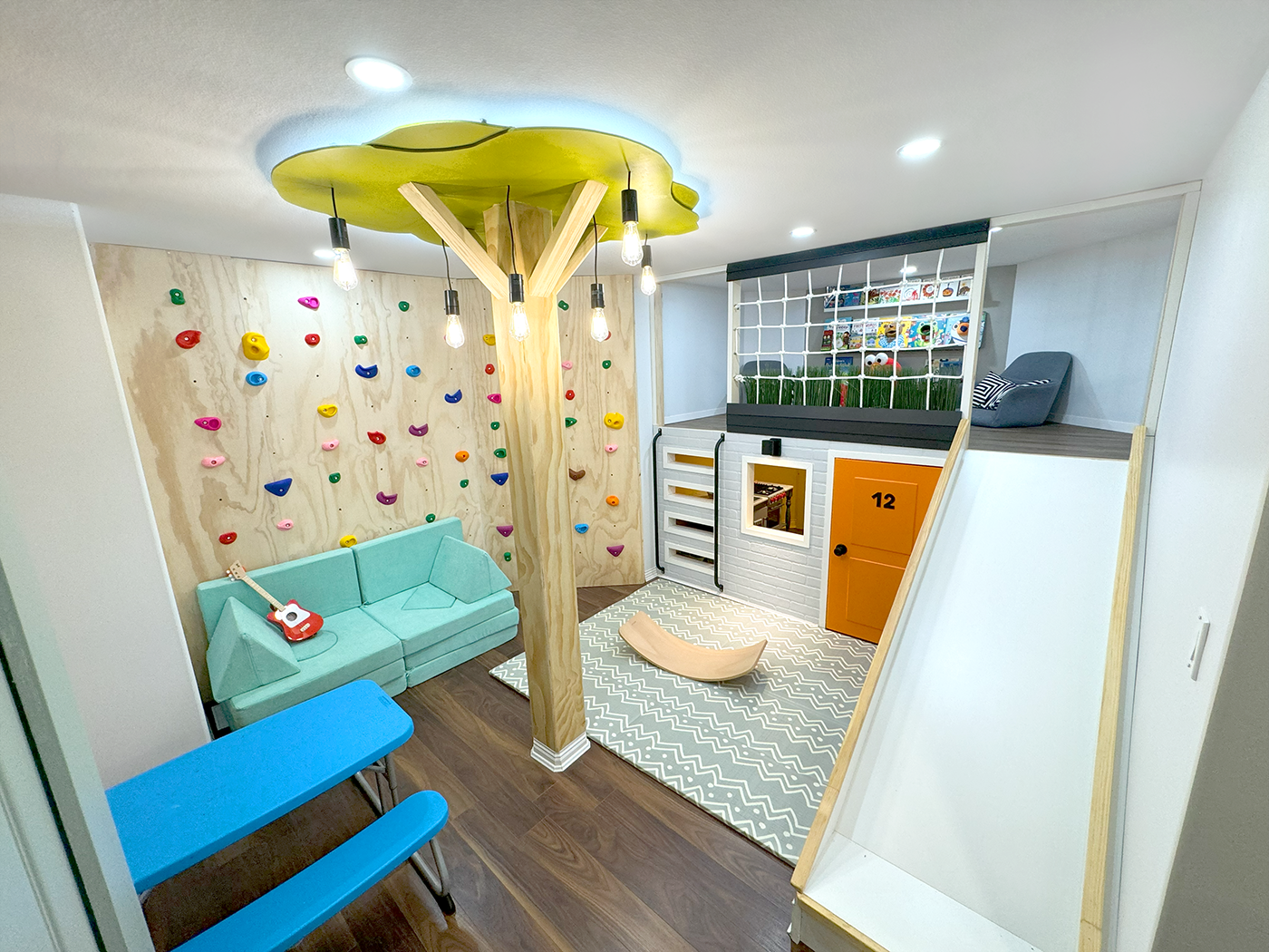 Purposeful playroom design with defined zones for movement, pretend play, and independent exploration